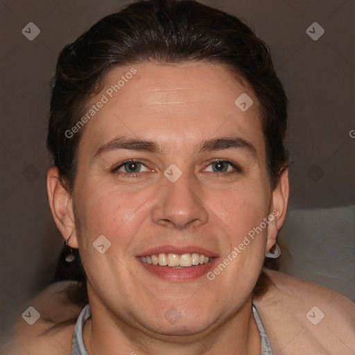 Joyful white adult female with short  brown hair and brown eyes