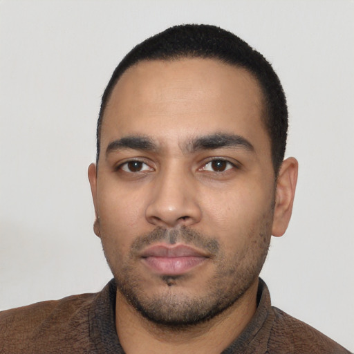 Neutral latino young-adult male with short  black hair and brown eyes