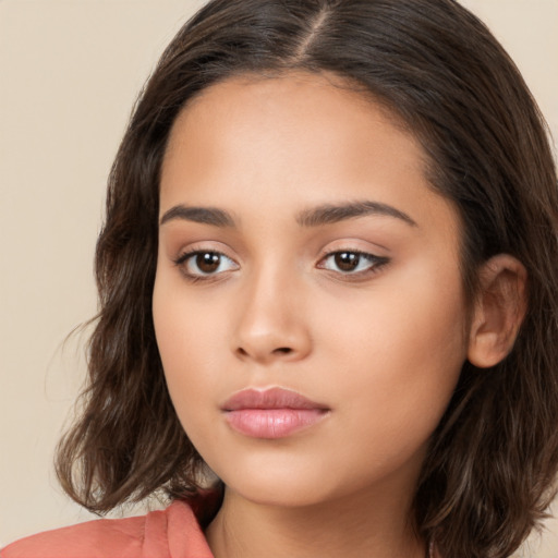 Neutral white young-adult female with long  brown hair and brown eyes