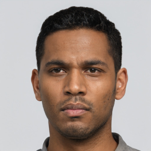 Neutral black young-adult male with short  black hair and brown eyes