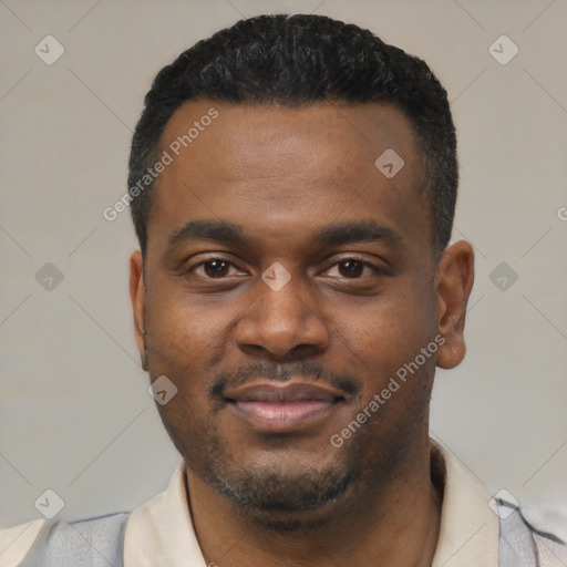 Joyful black young-adult male with short  black hair and brown eyes