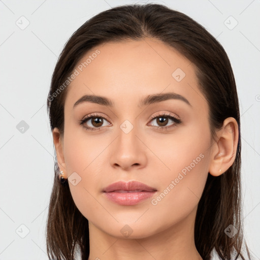 Neutral white young-adult female with long  brown hair and brown eyes