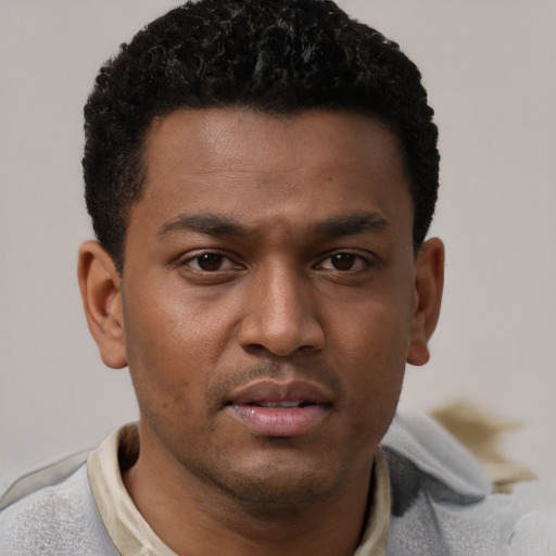 Neutral black young-adult male with short  brown hair and brown eyes