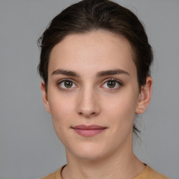 Neutral white young-adult female with medium  brown hair and brown eyes