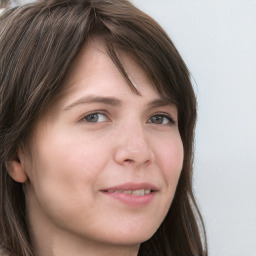 Neutral white young-adult female with long  brown hair and grey eyes