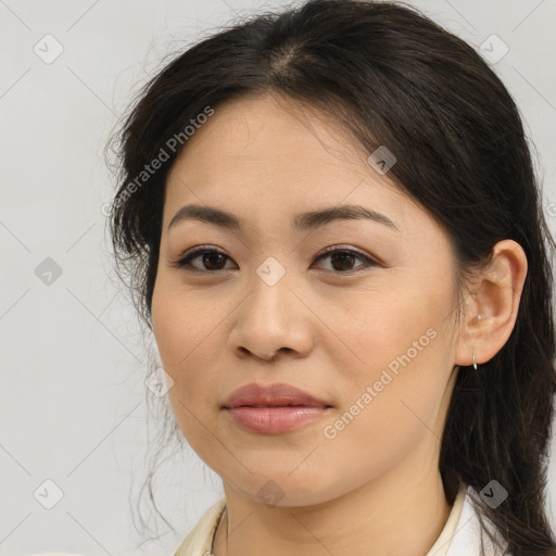 Joyful asian young-adult female with medium  brown hair and brown eyes