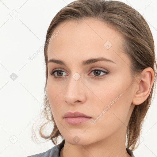 Neutral white young-adult female with medium  brown hair and brown eyes