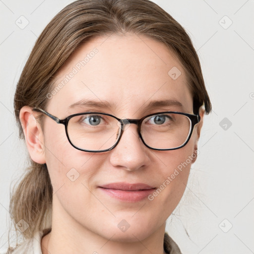 Joyful white young-adult female with medium  brown hair and blue eyes