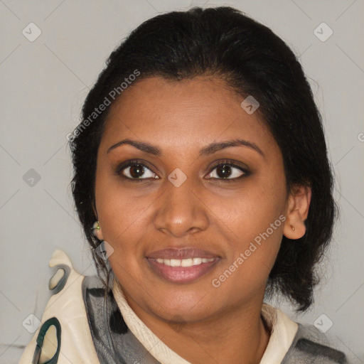 Joyful latino young-adult female with medium  brown hair and brown eyes