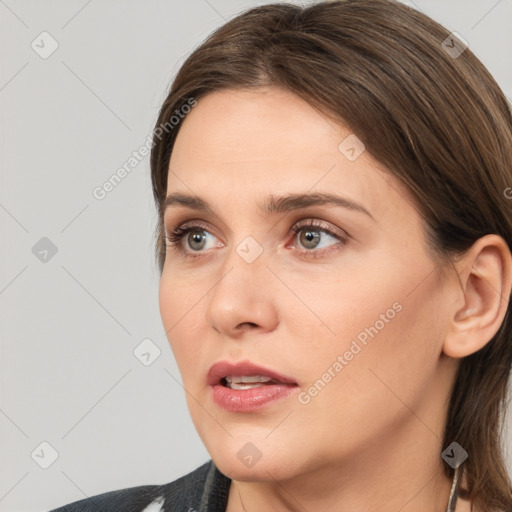 Neutral white young-adult female with medium  brown hair and brown eyes