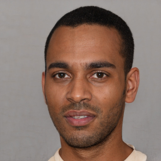 Neutral latino young-adult male with short  black hair and brown eyes