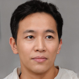 Neutral asian young-adult male with short  brown hair and brown eyes