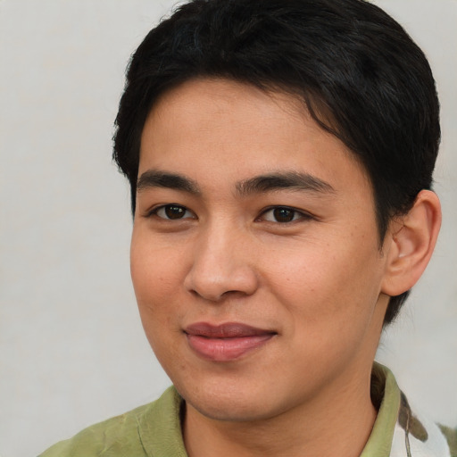 Joyful asian young-adult female with short  brown hair and brown eyes
