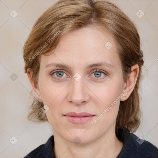 Joyful white young-adult female with medium  brown hair and blue eyes