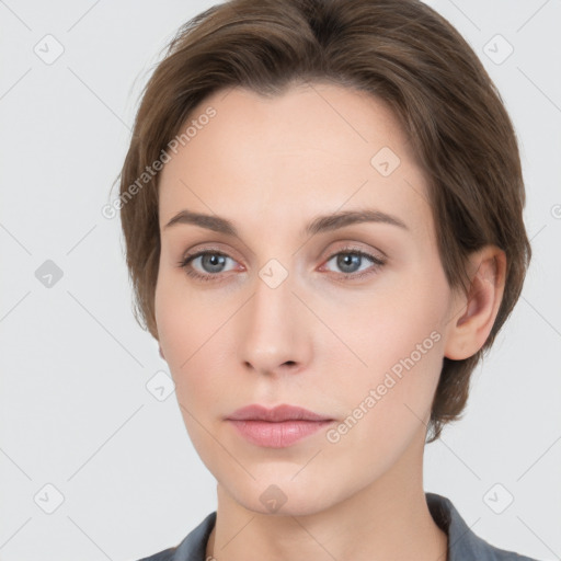 Neutral white young-adult female with medium  brown hair and grey eyes