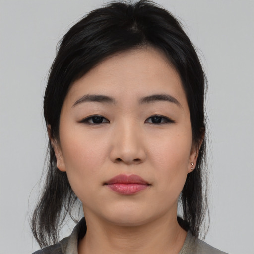 Neutral asian young-adult female with medium  black hair and brown eyes