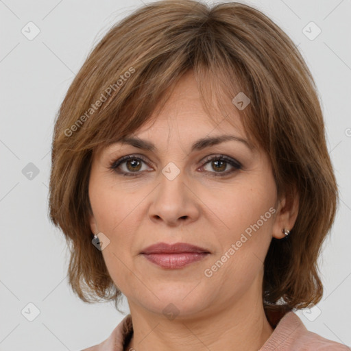 Joyful white adult female with medium  brown hair and brown eyes