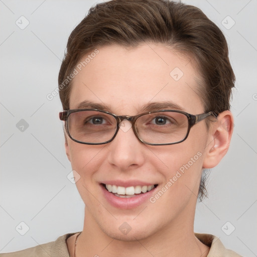 Joyful white adult female with short  brown hair and brown eyes