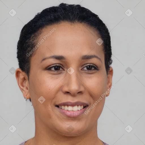 Joyful latino adult female with short  brown hair and brown eyes