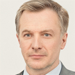 Neutral white adult male with short  brown hair and grey eyes