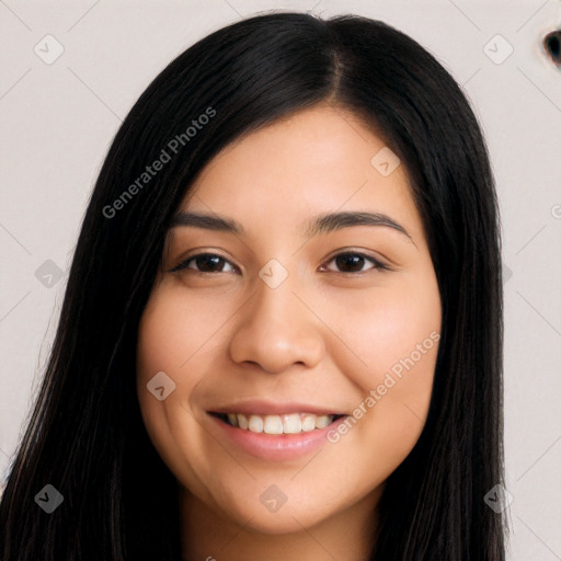 Joyful latino young-adult female with long  black hair and brown eyes