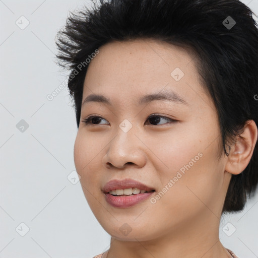 Joyful asian young-adult female with medium  black hair and brown eyes