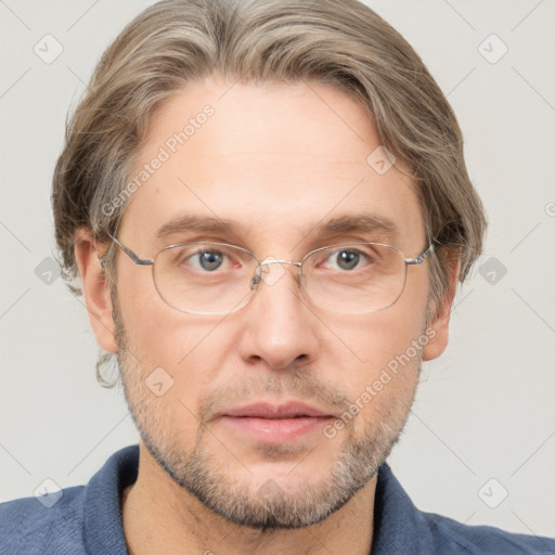 Neutral white adult male with short  brown hair and grey eyes