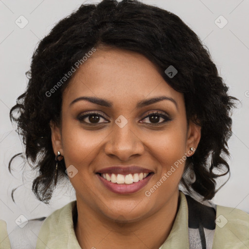 Joyful black young-adult female with long  brown hair and brown eyes