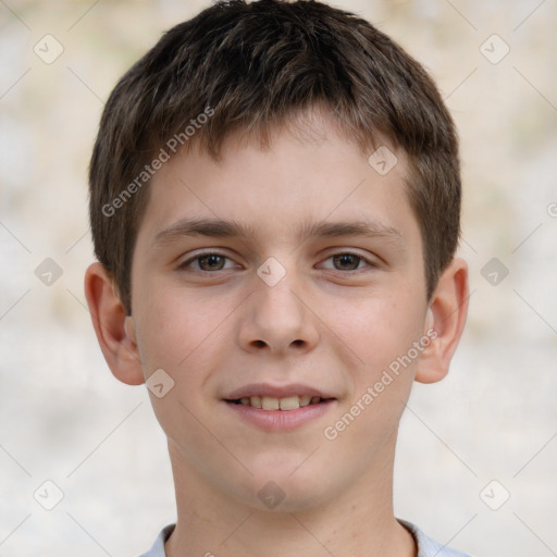 Joyful white child male with short  brown hair and brown eyes