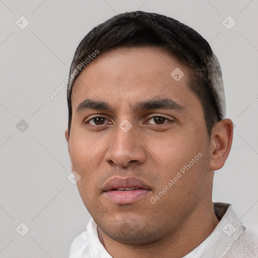 Neutral white young-adult male with short  black hair and brown eyes