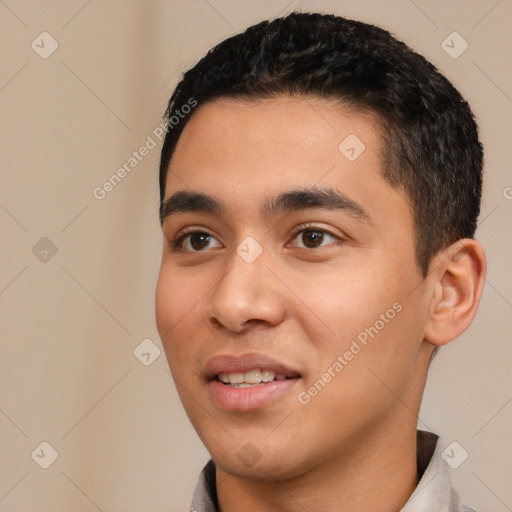 Joyful white young-adult male with short  black hair and brown eyes