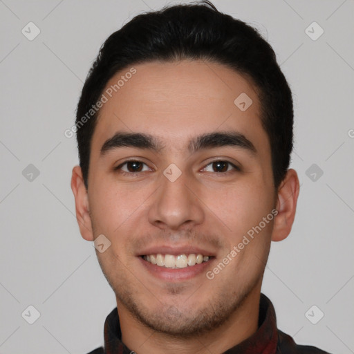 Joyful white young-adult male with short  black hair and brown eyes