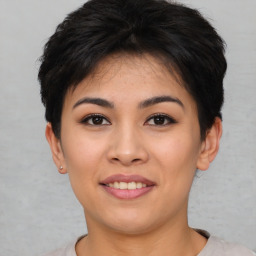 Joyful asian young-adult female with short  brown hair and brown eyes