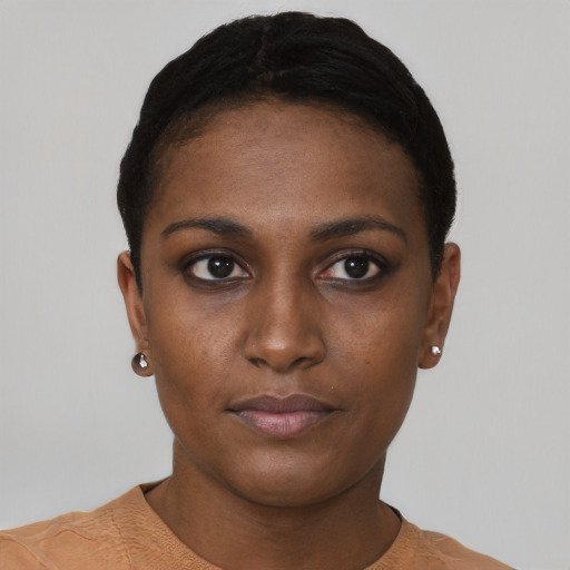 Neutral black young-adult female with short  black hair and brown eyes
