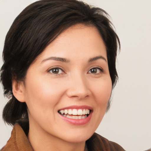 Joyful white young-adult female with medium  brown hair and brown eyes