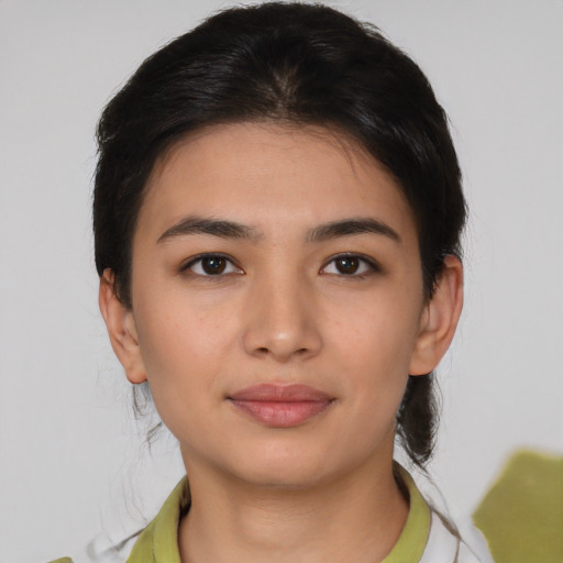Neutral latino young-adult female with short  brown hair and brown eyes