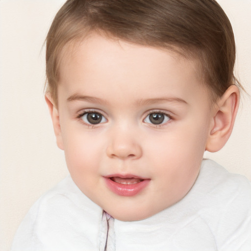 Joyful white child female with short  brown hair and brown eyes