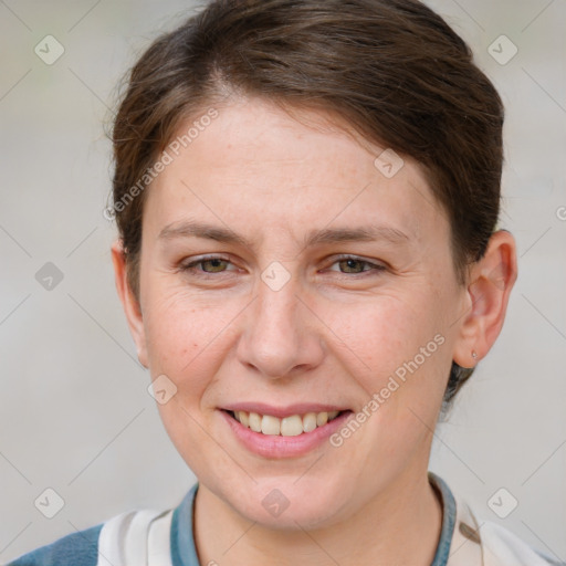 Joyful white young-adult female with short  brown hair and grey eyes