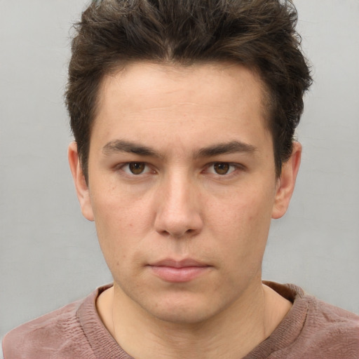 Neutral white young-adult male with short  brown hair and grey eyes