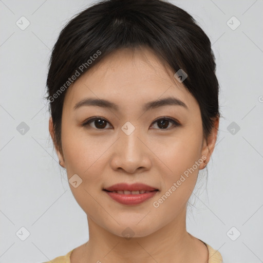 Joyful asian young-adult female with medium  brown hair and brown eyes