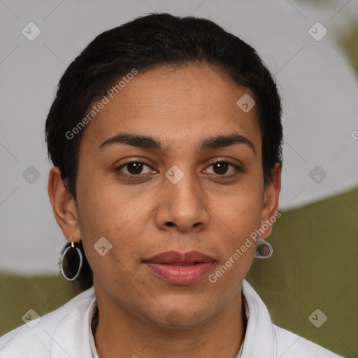 Joyful latino young-adult female with short  brown hair and brown eyes