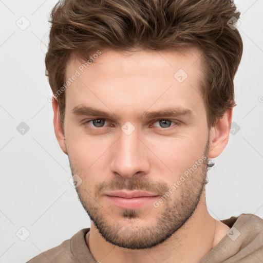 Neutral white young-adult male with short  brown hair and grey eyes