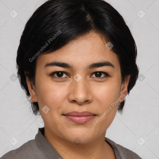 Joyful asian young-adult female with medium  black hair and brown eyes