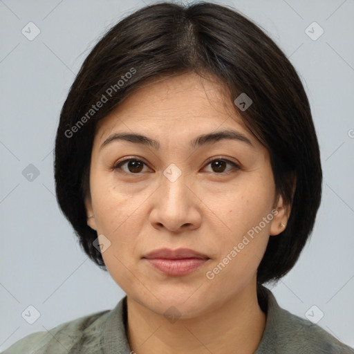 Joyful white adult female with medium  brown hair and brown eyes