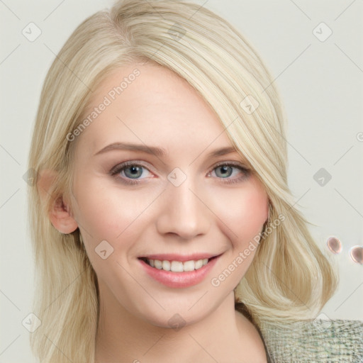 Joyful white young-adult female with medium  blond hair and blue eyes