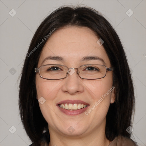 Joyful white adult female with medium  brown hair and brown eyes