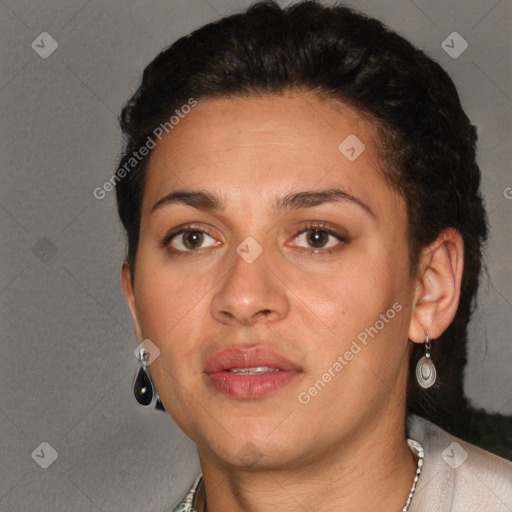 Joyful latino adult female with short  brown hair and brown eyes