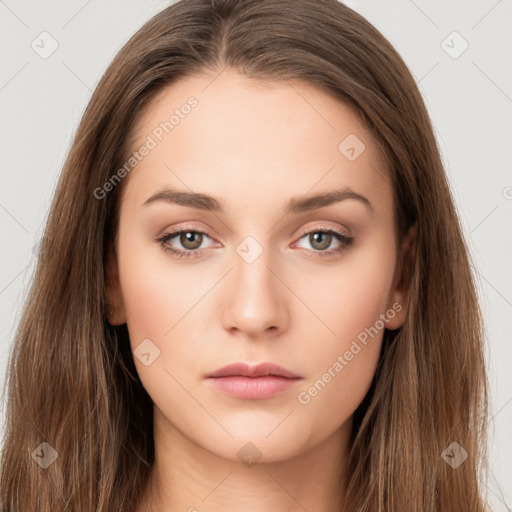 Neutral white young-adult female with long  brown hair and brown eyes