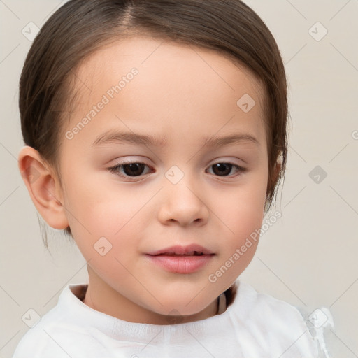 Joyful white child female with short  brown hair and brown eyes