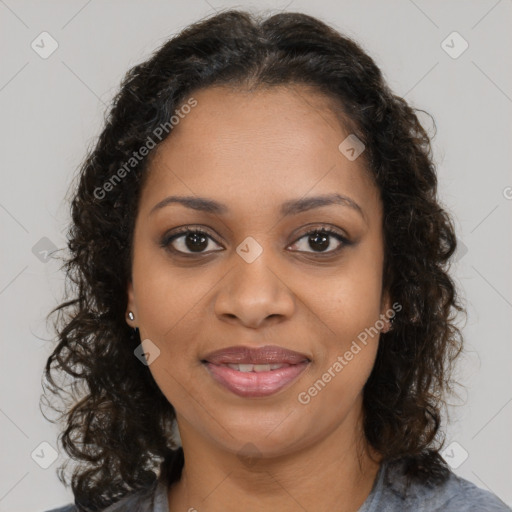 Joyful black young-adult female with medium  brown hair and brown eyes